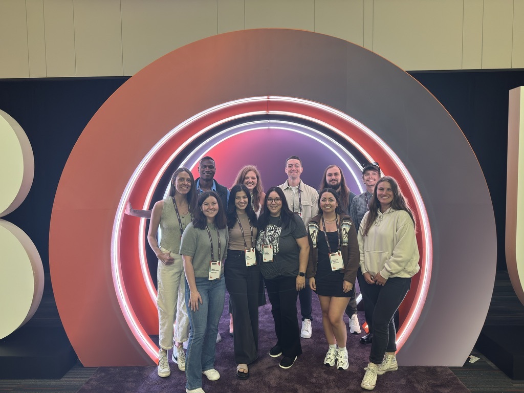 Miles Ukaoma with his marketing team at a ring-light activation